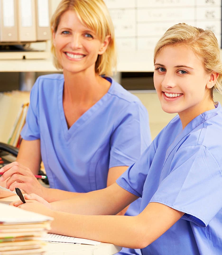 two female medical staffs smiling